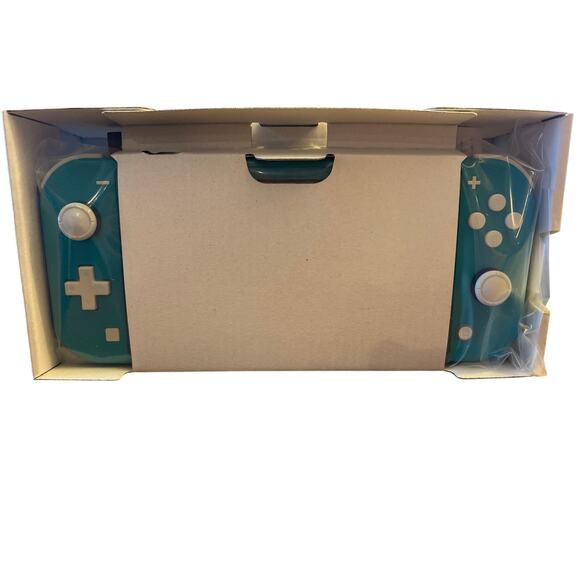 Nintendo Switch Lite
New in box
Turquoise - Picture 3 of 4
